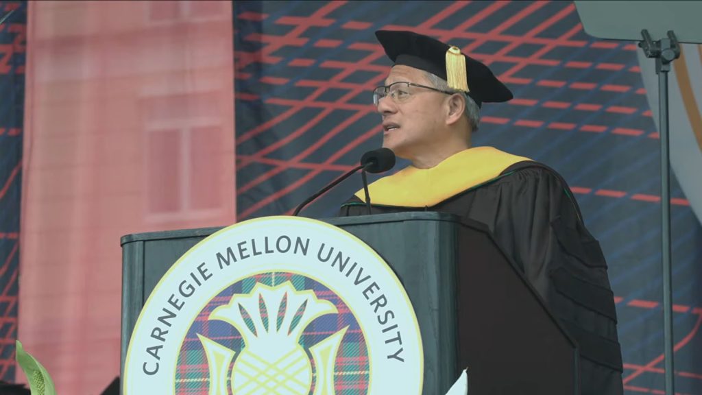 Jensen Huang at the podium during Carnegie Mellon University's 2026 commencement address